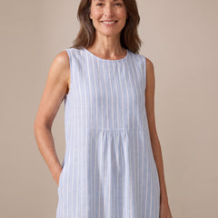 Close-up of The Adele dress round neckline, gathered yoke seam and striped linen texture
