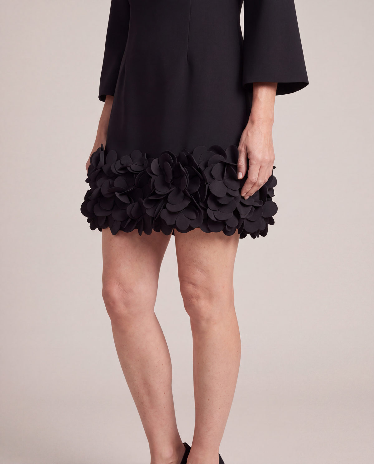 Solange black mini dress 3D petal hem close-up