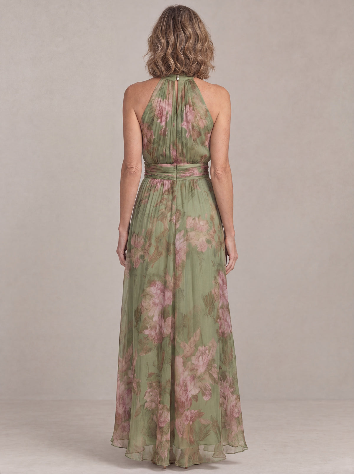 Liora floral chiffon maxi dress, back view with open back and button closure at the neck