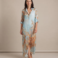 Woman walking in the Ottavia baroque print shirt maxi dress
