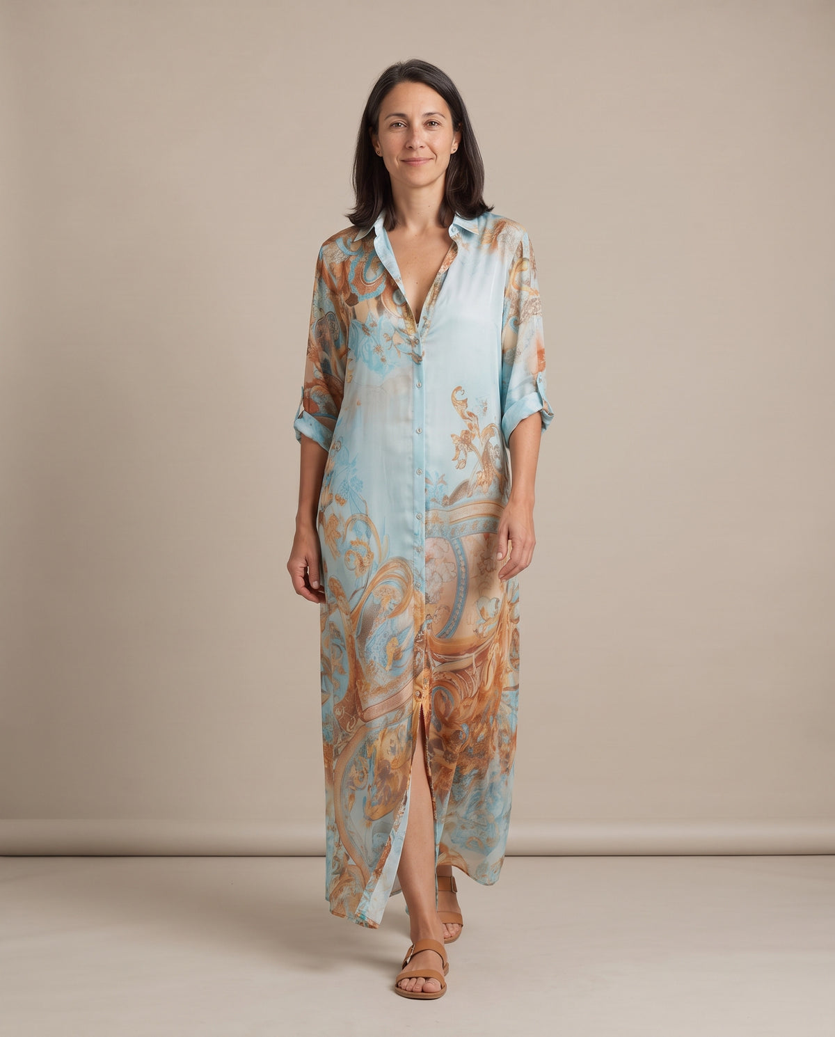 Woman walking in the Ottavia baroque print shirt maxi dress