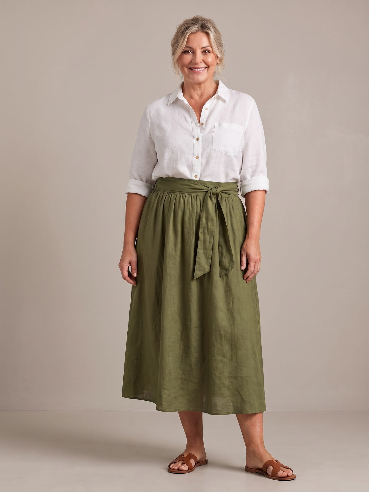 Rosalind set in white shirt and olive skirt